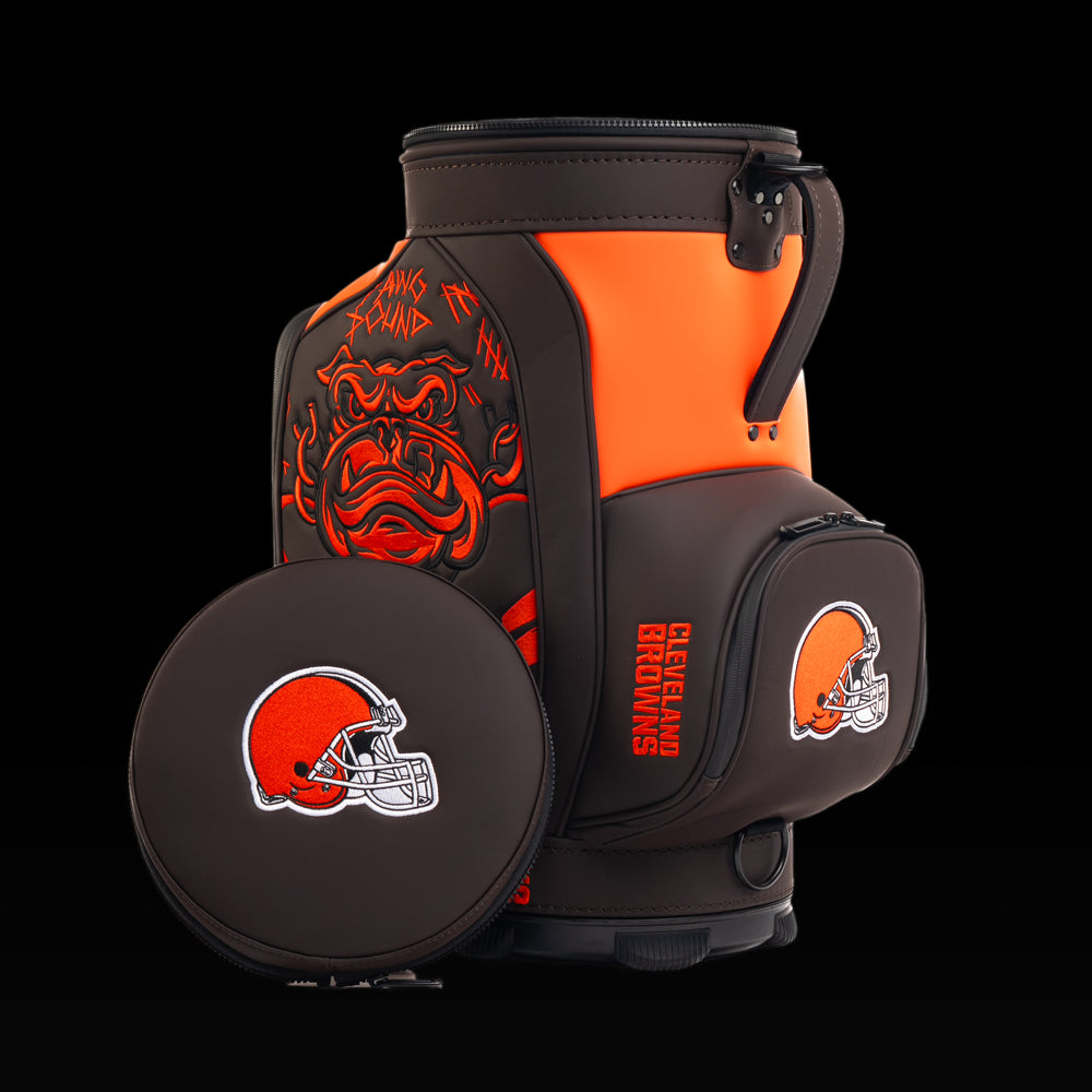 Cleveland Browns Den Caddy Cooler displayed with the removable embroidered lid beside the cooler.