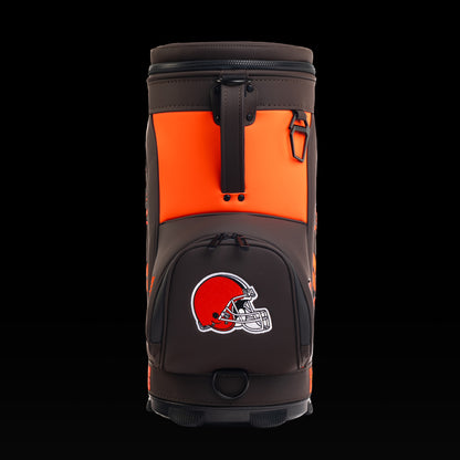 Rear view of the SWAG Golf Cleveland Browns Den Caddy Cooler with orange and brown color blocking and Browns helmet. 