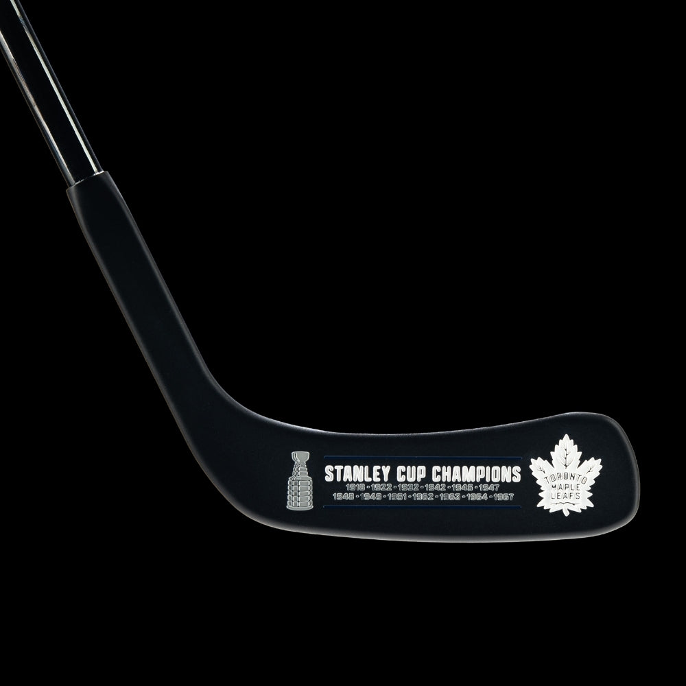 Hockey stick putter with Toronto Maple Leafs and Stanley Cup Champions logo.