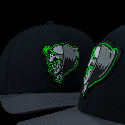 SWAG Golf Grim Reefer themed black and grey 6-panel snapback hat with 420 themed rubber patch and side embroidery.
