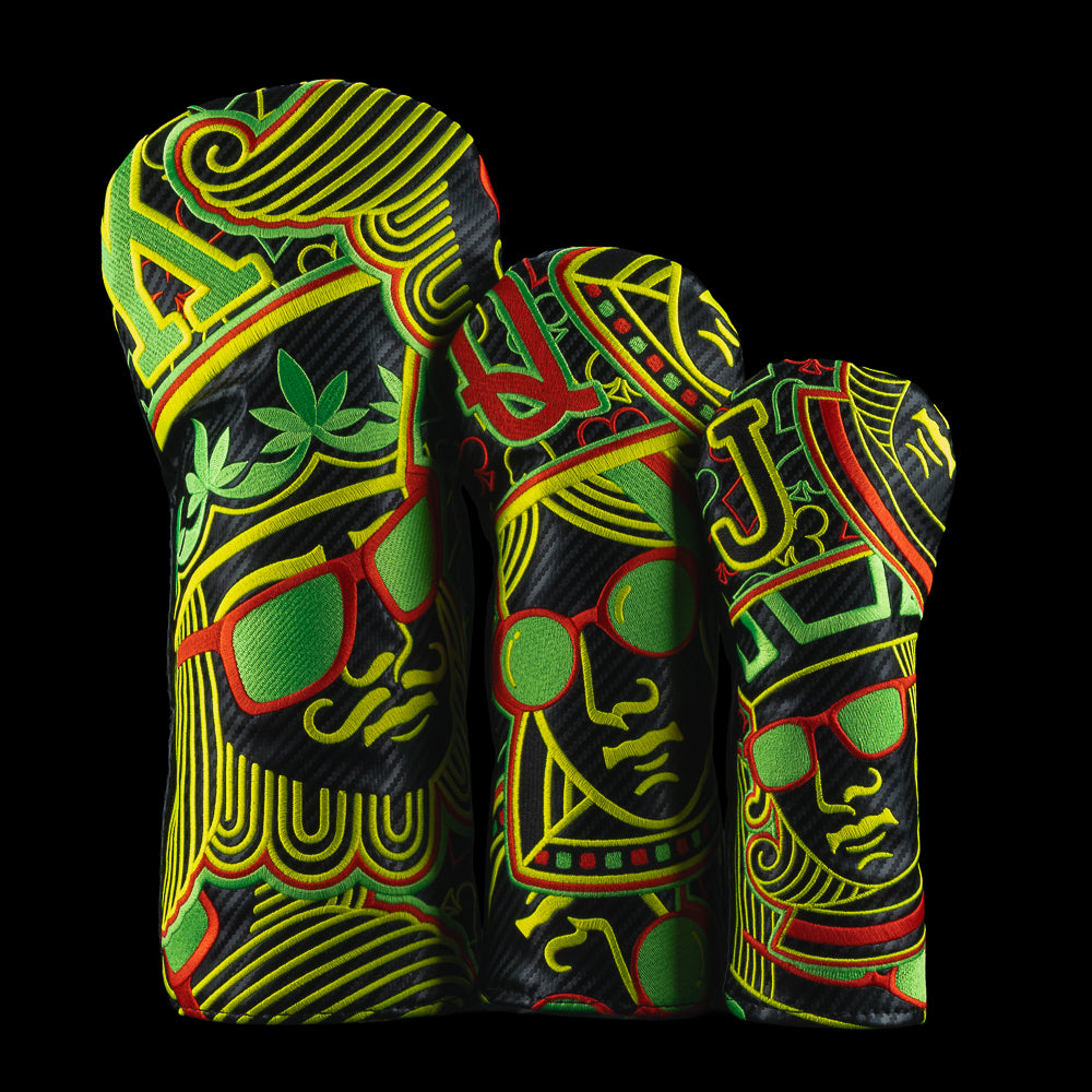 SWAG Golf Rasta Royal Straight golf wood cover set featuring driver, fairway, and hybrid in black, green, red, and yellow colors.