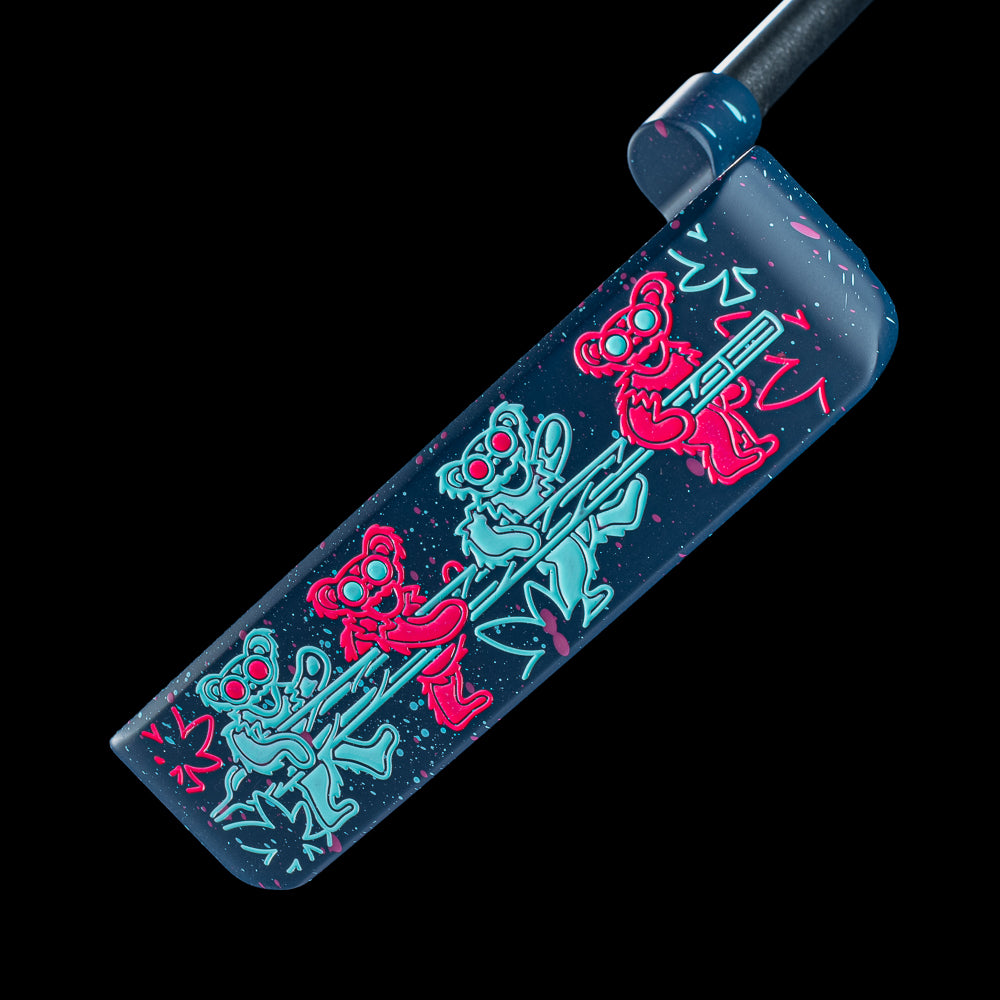 SWAG Golf Touch of Neon 2.0 Handsome One Putter featuring a splatter cerakote finish with handpainted teal and neon pink 420 bears.