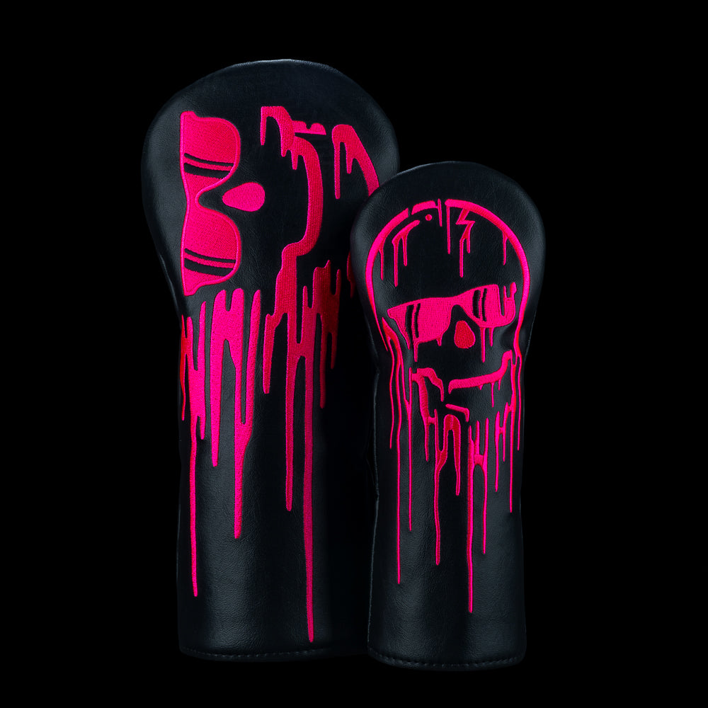 Dripping Skull pink 2 piece wood cover set with black wood covers and bright pink dripping skull graphics.