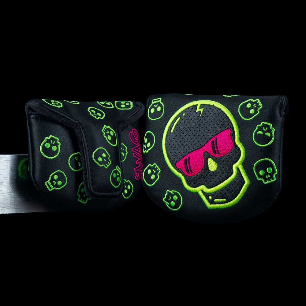 Pink and Bolt Boss mallet cover with green skull pattern on black background. Large skull in the middle with pink sunglasses. 