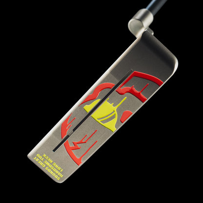 SWAG Golf RAD Handsome Too Longneck limited edition golf putter with a black oxide finish, sound slot, and red and yellow dripping skull design on the sole.