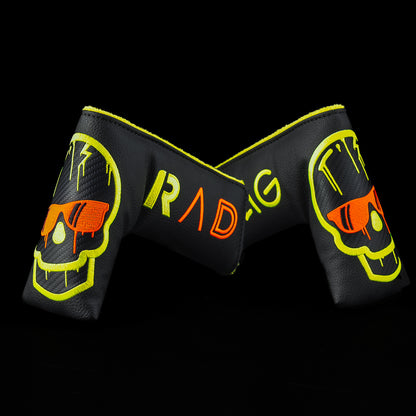 SWAG Golf RAD Handsome Too Longneck limited edition golf putter with a black oxide finish, sound slot, and red and yellow dripping skull design on the sole.