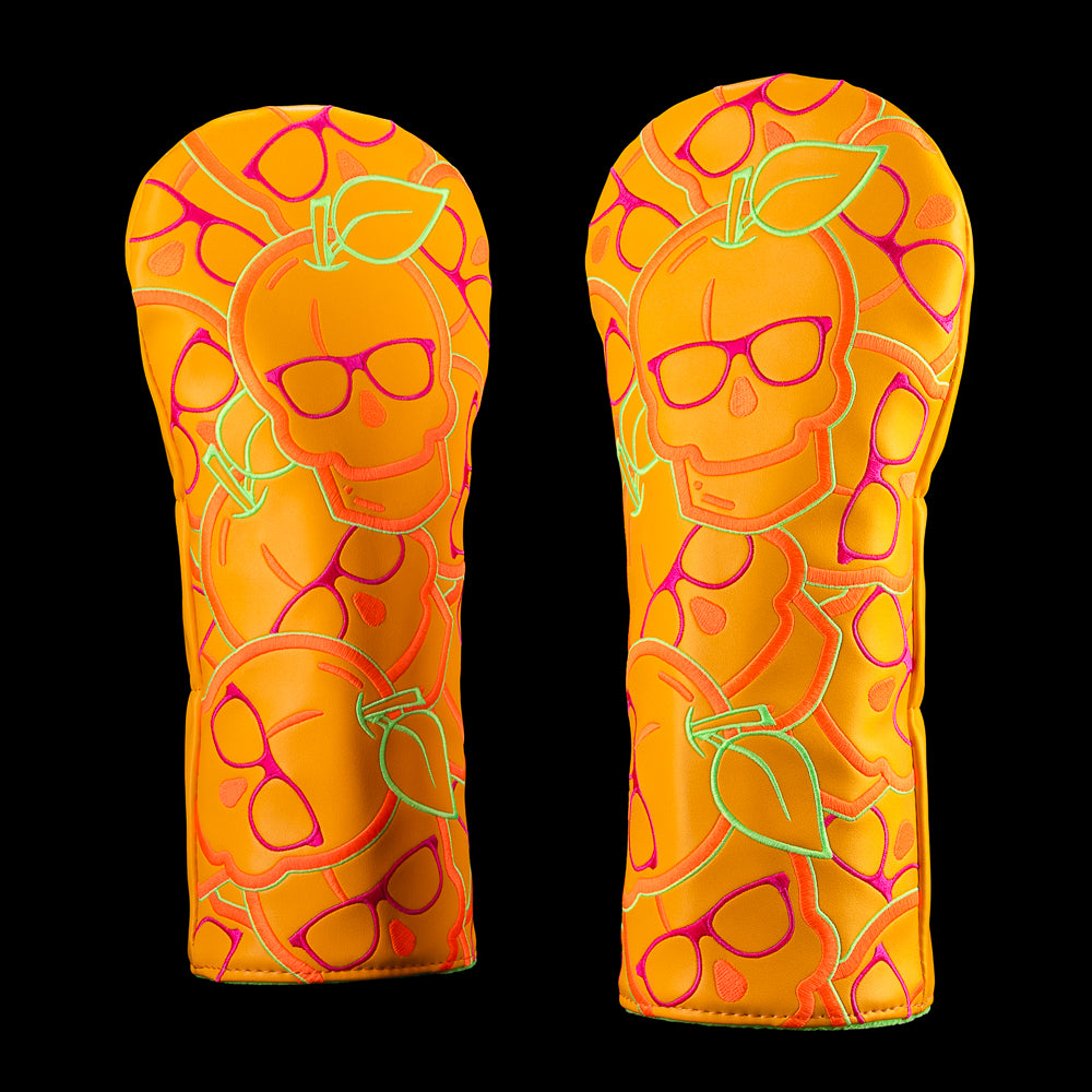 Stacked Peach Skull driver cover with repeated peach skull graphics on orange background.