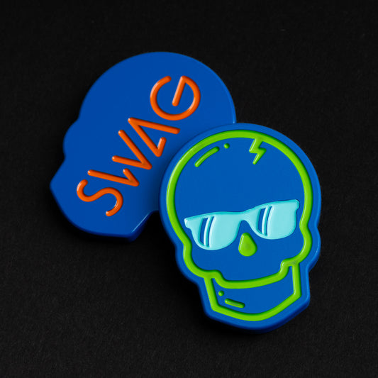 Swag skull stainless steel blue ceramic coated golf ball marker accessory.