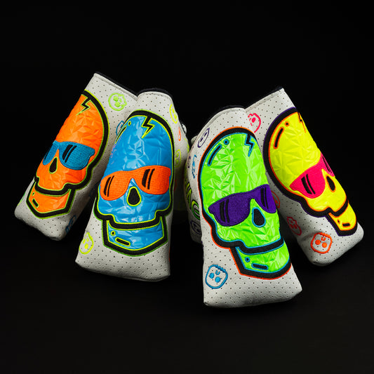 Hot Stuff Neon orange, blue, green and yellow Skull Blade putter golf club headcovers made in the USA.