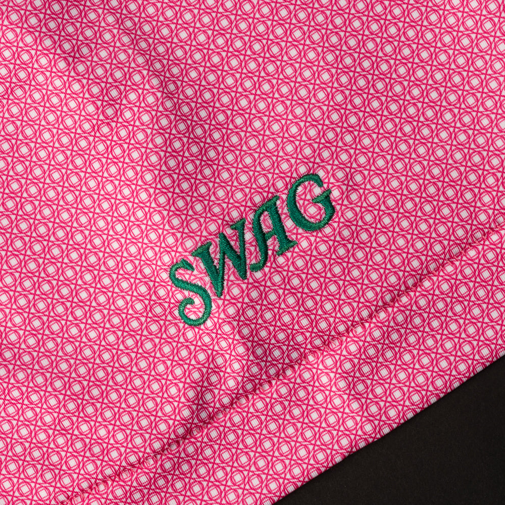 Swag x Peter Millar Azalea Skull Polo Shirt in pink with green and yellow.