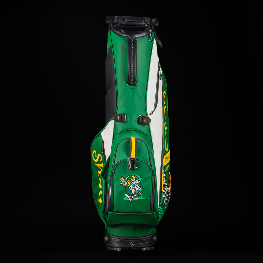 Swag x Vessel STFU forest green stand golf bag with yellow and white.