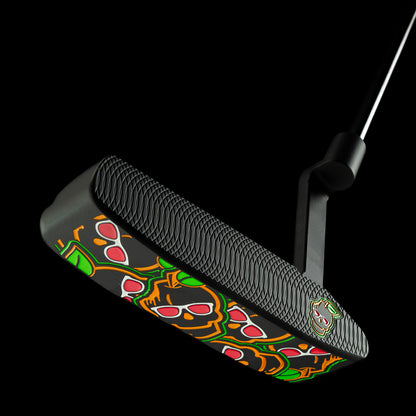 Stacked Juicy Peach Handsome Too black cerakote peach themed golf putter made in the USA.