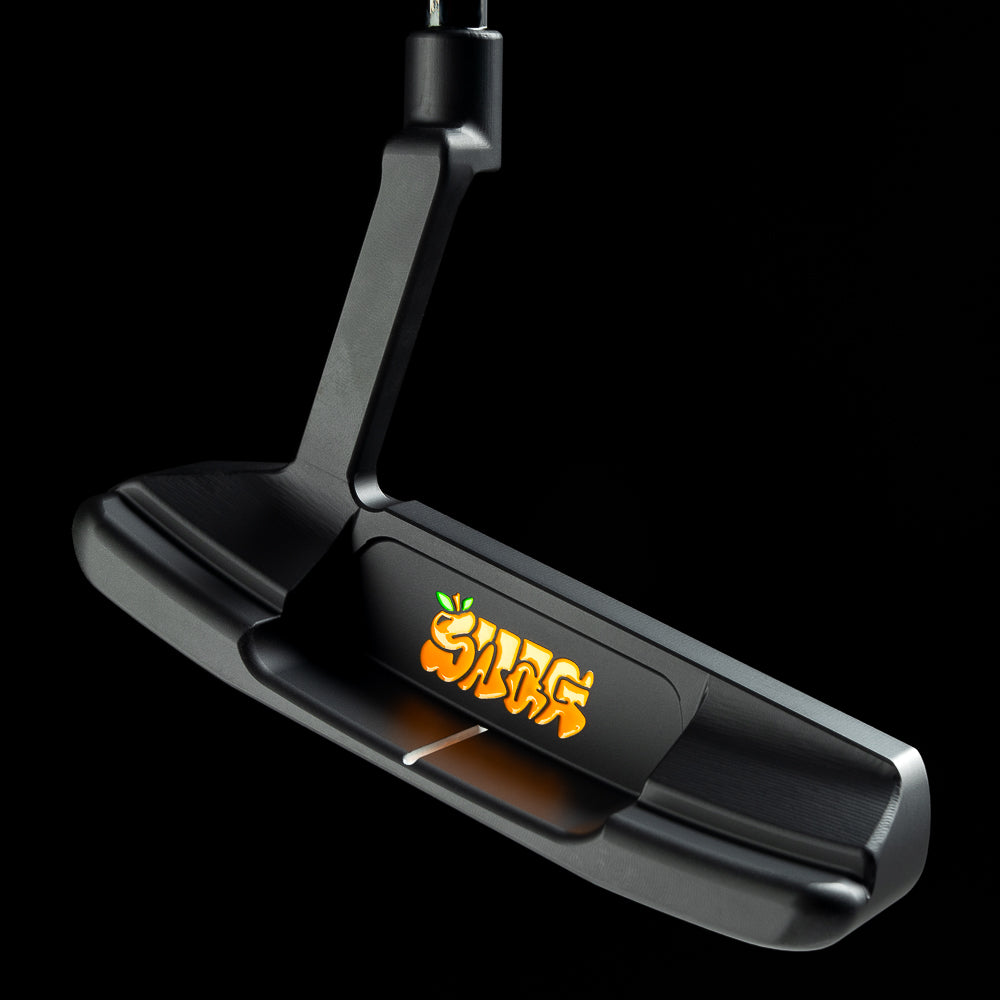 Stacked Juicy Peach Handsome Too black cerakote peach themed golf putter made in the USA.