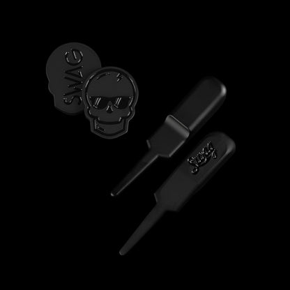 SWAG Golf blackout skull ball marker and divot tool two-piece golf accessory set.