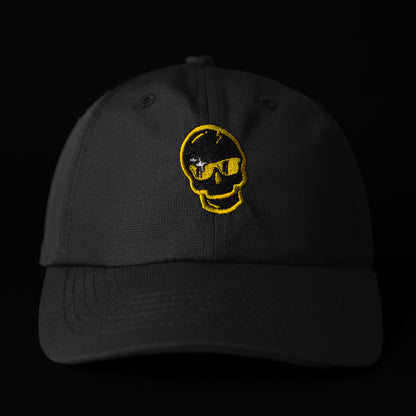 SWAG x Imperial black performance golf hat with yellow sparkle skull logo.