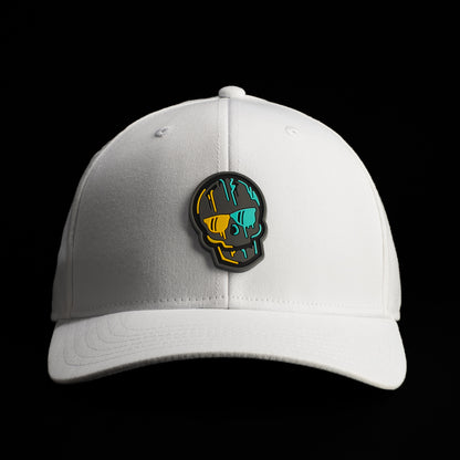 Front view of a white SWAG Golf hat featuring a graphic skull patch with teal, oranges, and black/grey accents.