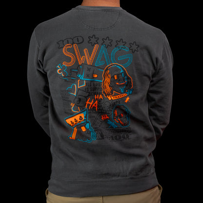 Back view of a black SWAG Golf sweatshirt featuring a large multicolor “Greatest Hits” graphic with icons and lettering.