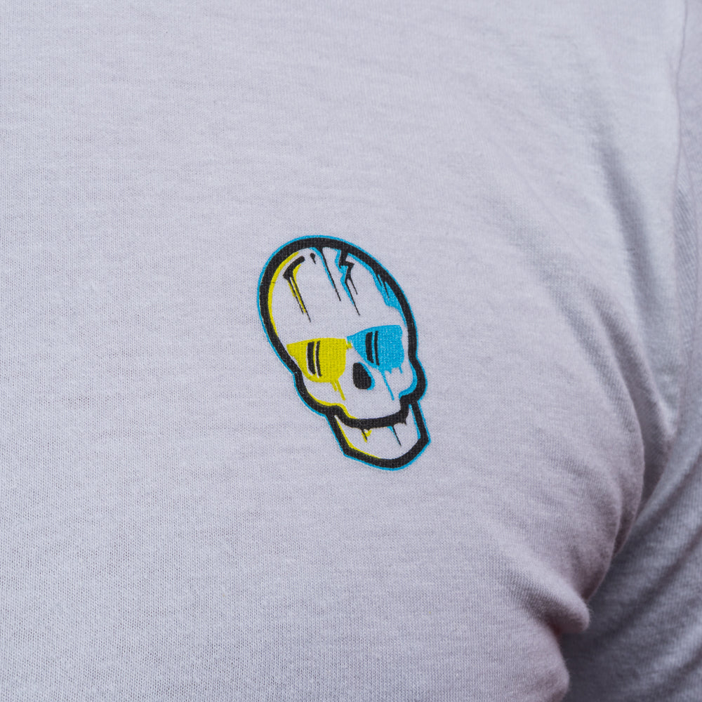 Close-up of the blue-and-yellow SWAG Golf skull logo printed on the white T-shirt.