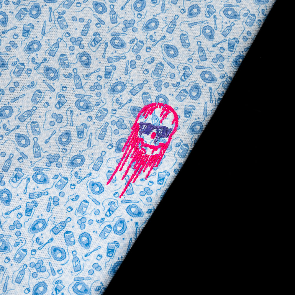 Blue Oyster Pattern Peter Millar Polo with a neon pink dripping skull.