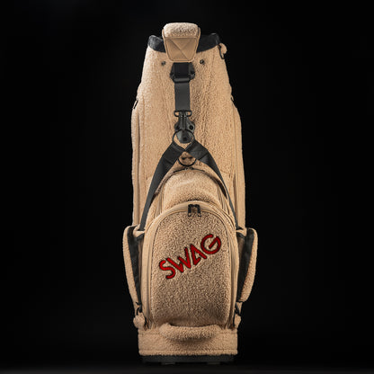 Mutts Putts Staff Bag made of teddy bear sherpa with a dog face stitched on the front and Mutts Putt tag on the side.