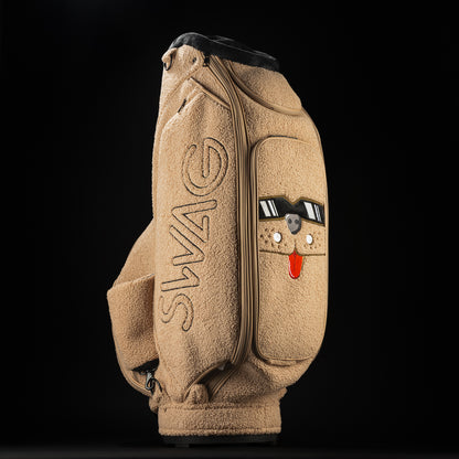 Mutts Putts Staff Bag made of teddy bear sherpa with a dog face stitched on the front and Mutts Putt tag on the side.