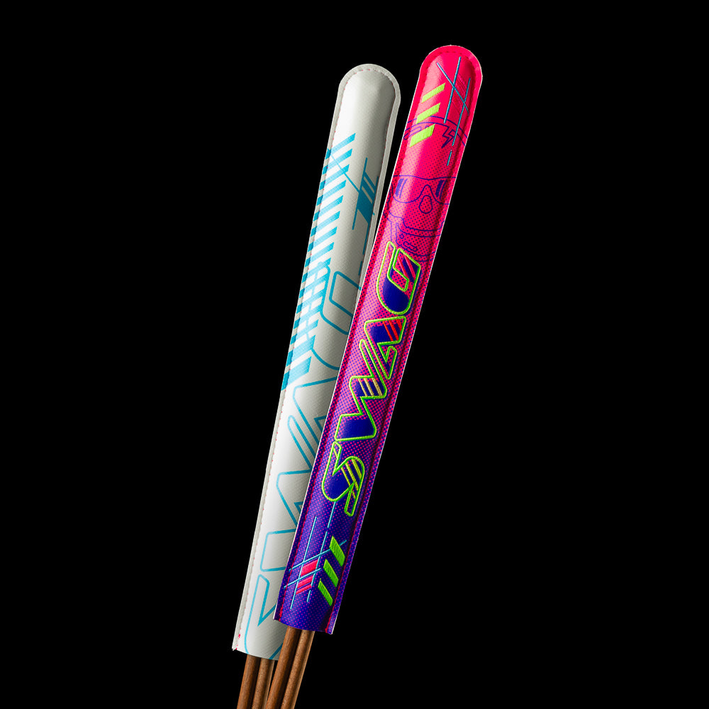 Retro Ski Alignment stick in neon pink, purple, baby blue and white.