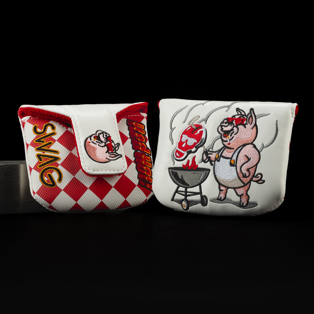 Totally Smoked white and red mallet golf headcover with a cartoon pig grilling. 