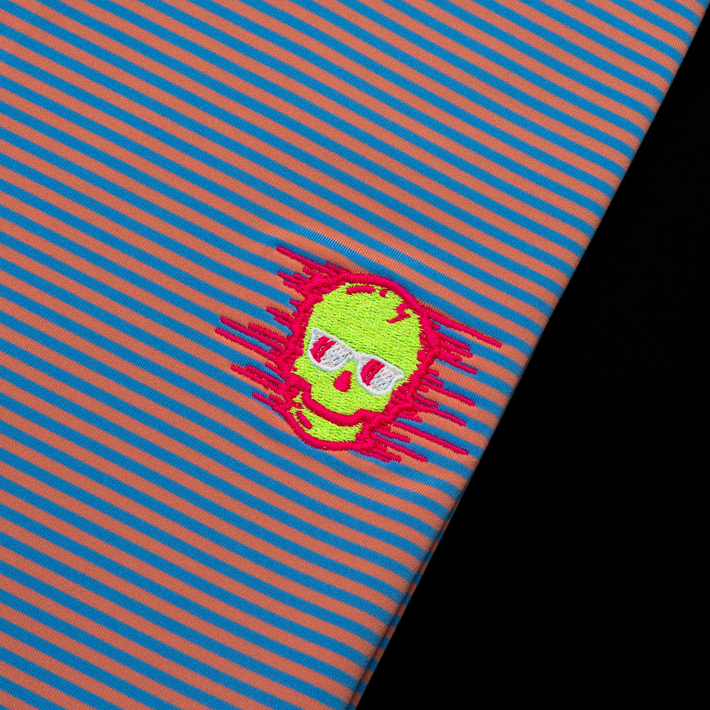 Orange and blue striped Peter Millar Polo with a neon yellow skull with hot pink.