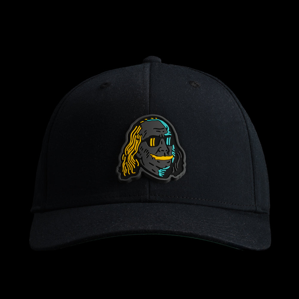 Front view of the Black Defaced Franklin hat featuring a colorful Franklin patch with teal, orange, and black graphic detailing.