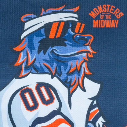 Golf towel with a graphic of a monster and a tram, featuring the 'Monsters at the Midway' logo and Chicago Bears branding.