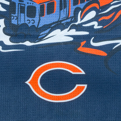 Golf towel with a graphic of a monster and a tram, featuring the 'Monsters at the Midway' logo and Chicago Bears branding.