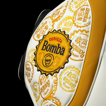 Close-up of embossed cerveza bottle cap pattern panel with large Bomba crest on the side of the Den Caddy.