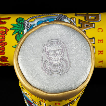 Top view of the Paharito Barrel Fairway cover showing metallic silver lid with subtle embroidered skull logo and gold rim.