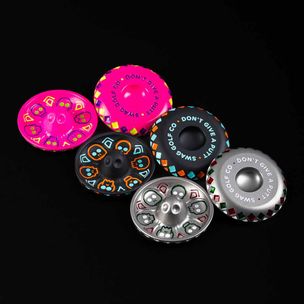 Pink, Black and Silver Sombrero ball marker with yellow, orange, teal, red and green.