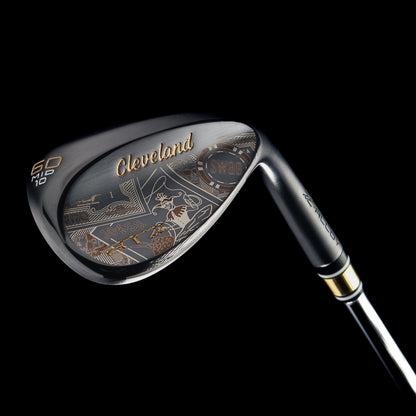 Black satin 60 degree golf wedge with Cleveland x SWAG Golf branding on a black background