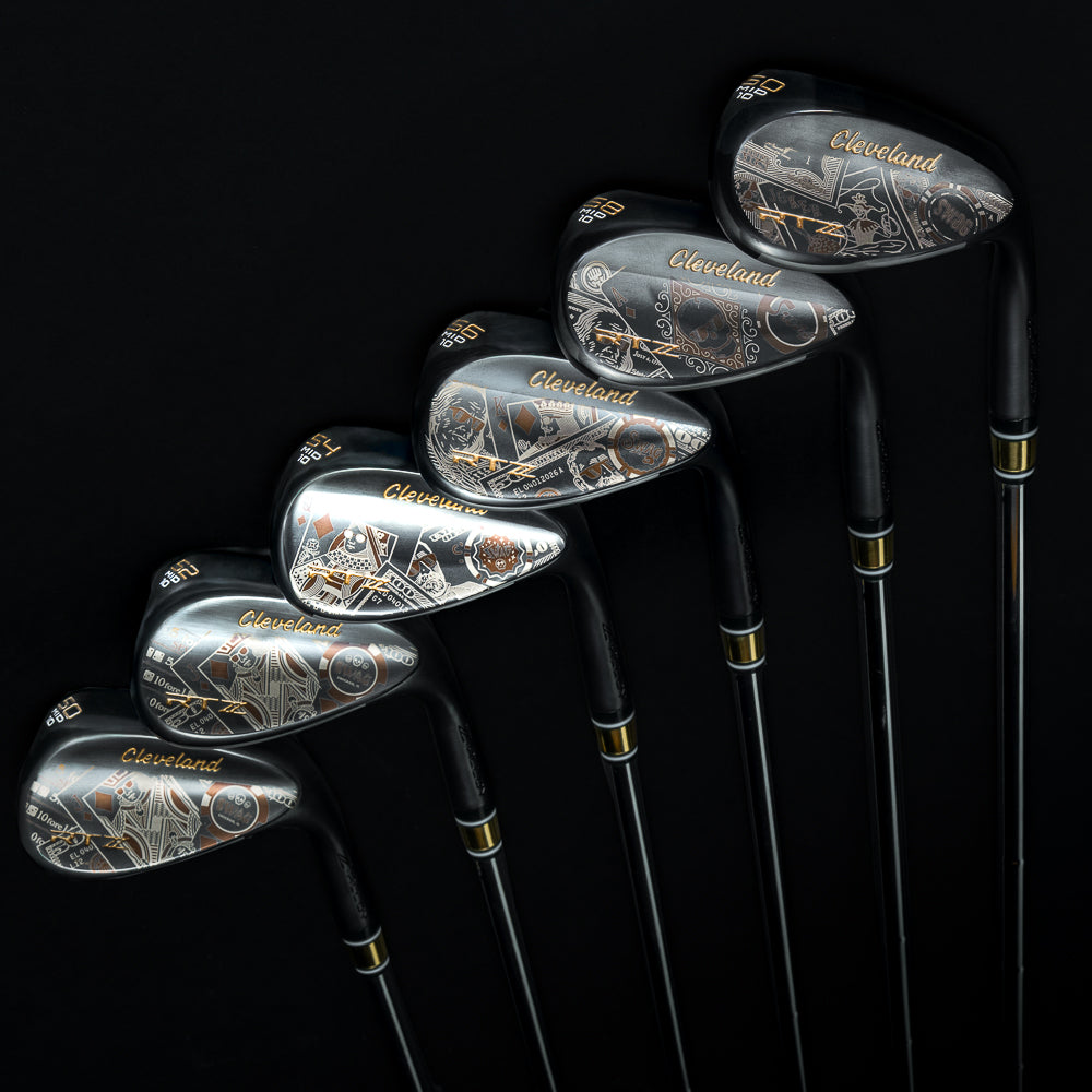 Set of black satin golf wedges with Cleveland x SWAG Golf branding on a black background