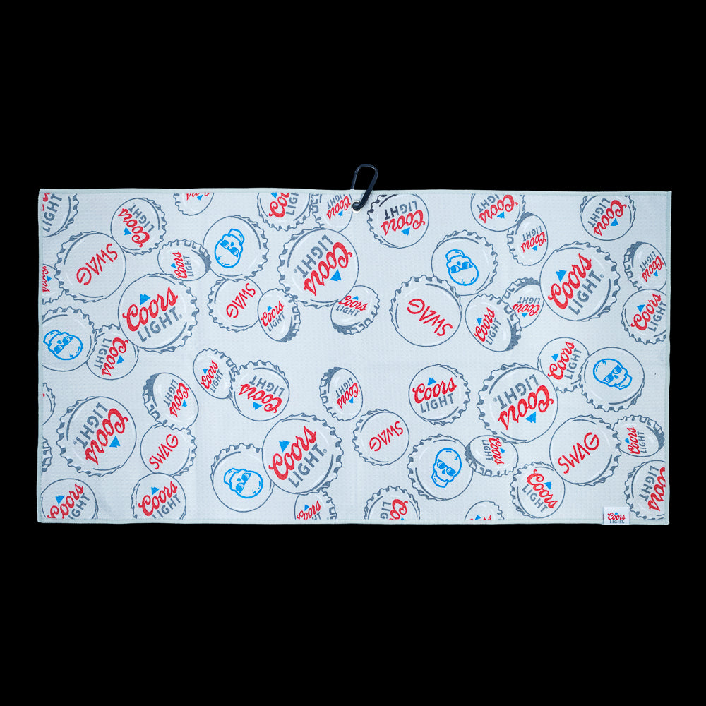 SWAG x Coors Light branded golf towel with stacked bottle caps design on a white background.