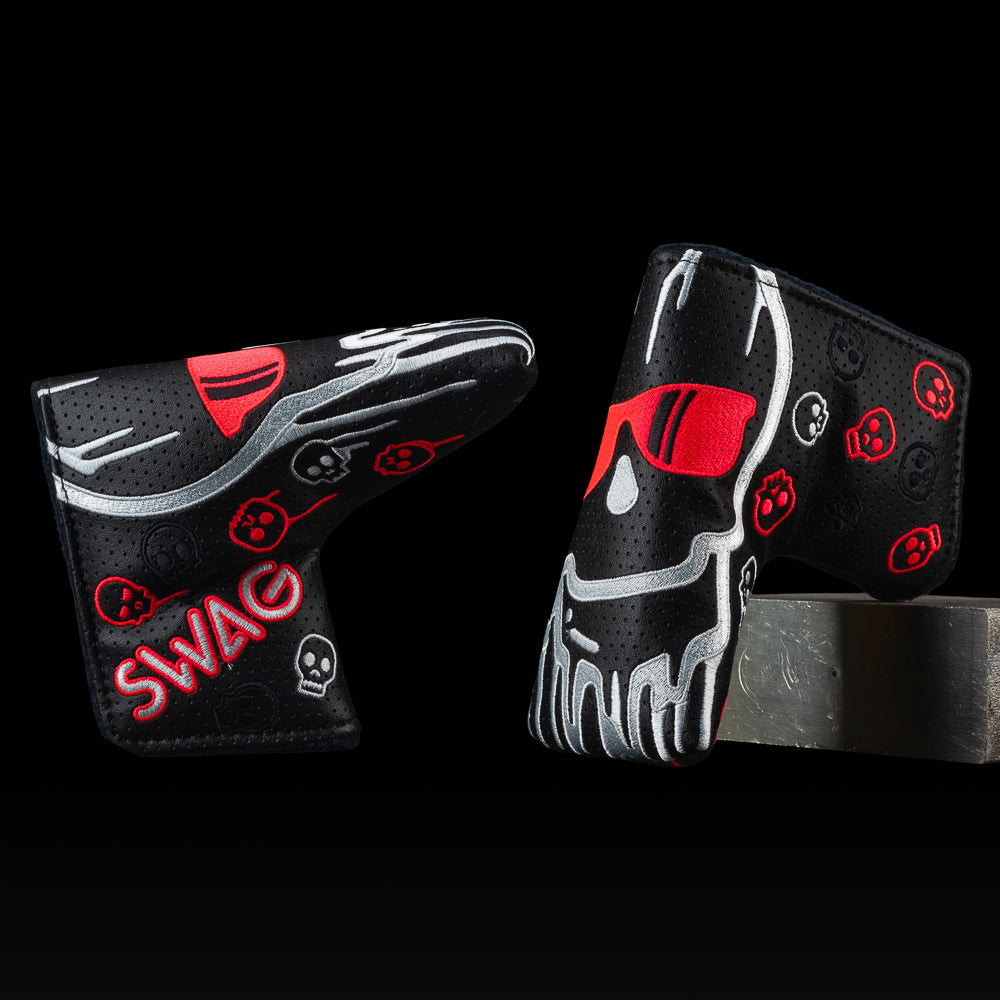 SWAG Golf jumbo dripping skull black perforated blade golf headcover with neon lava and white accents.
