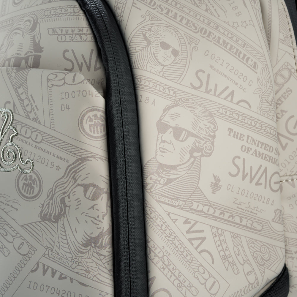 Cream currency themed backpack with 'SWAG' text and George washington embroidered details.