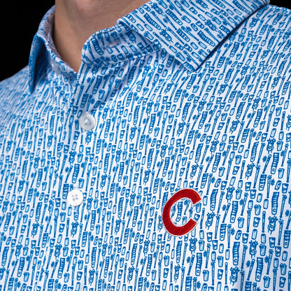 Close-up of the Chicago Cubs Beer Pattern Classic Polo Shirt with button collar, blue beer pattern, and embroidered Cubs chest logo.