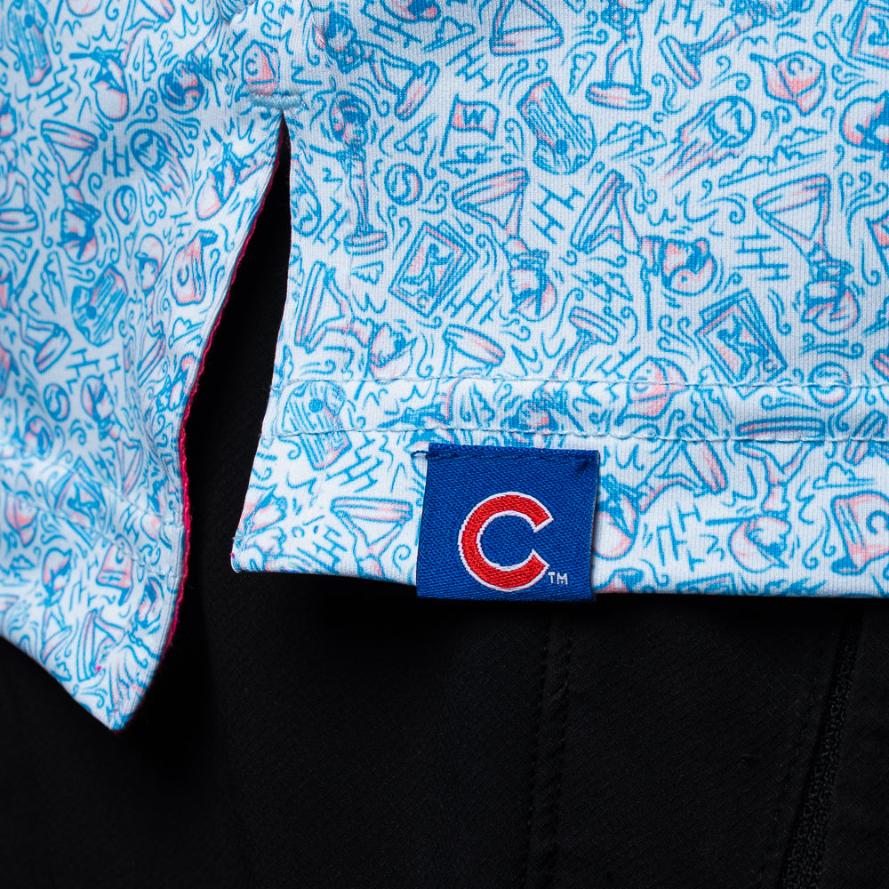 Close-up of the Chicago Cubs Bobblehead Classic Polo Shirt hem with all-over graphics and Cubs logo tab.