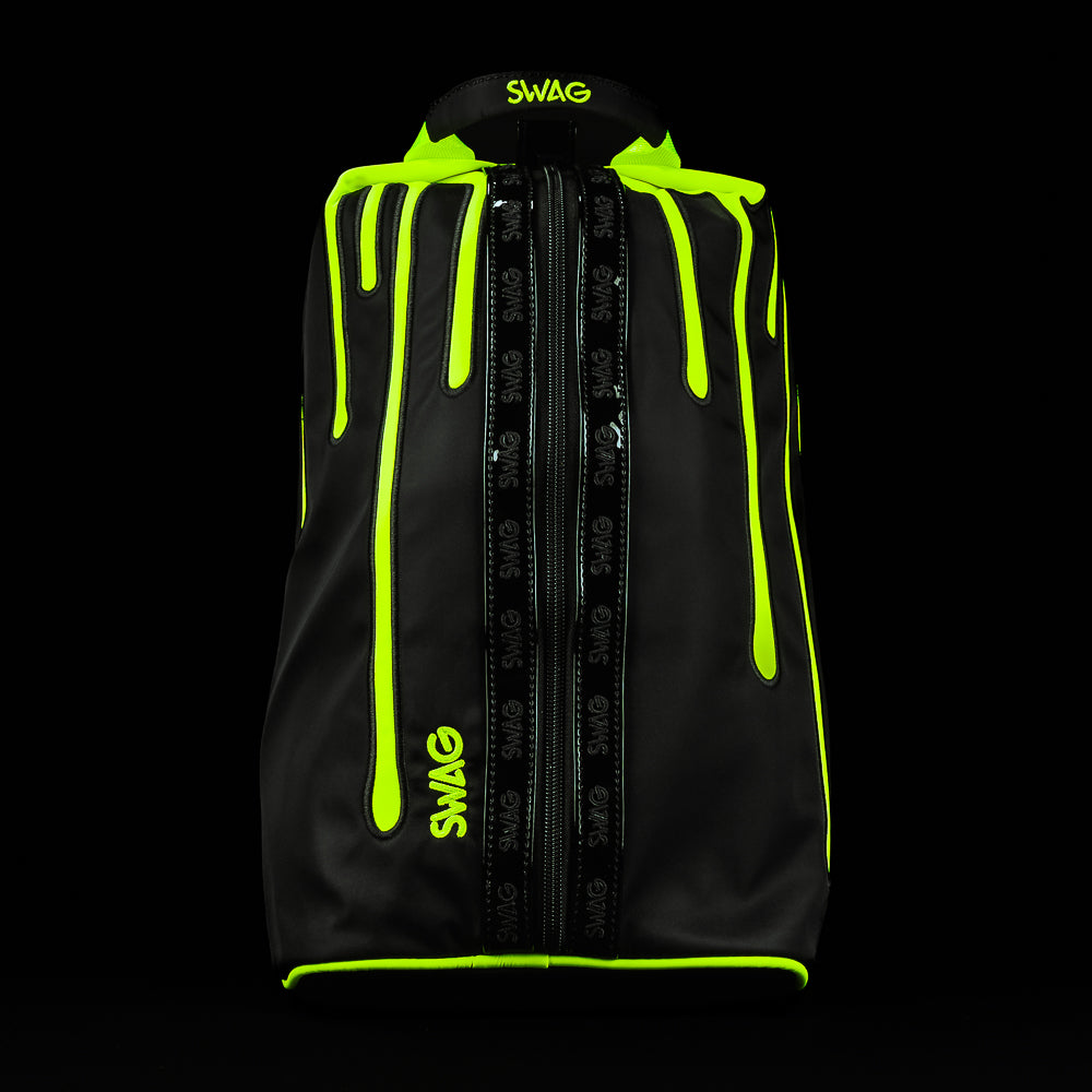 Front view of SWAG Neon Drip golf shoe bag featuring dripping skull logo and bold neon green drip graphics.