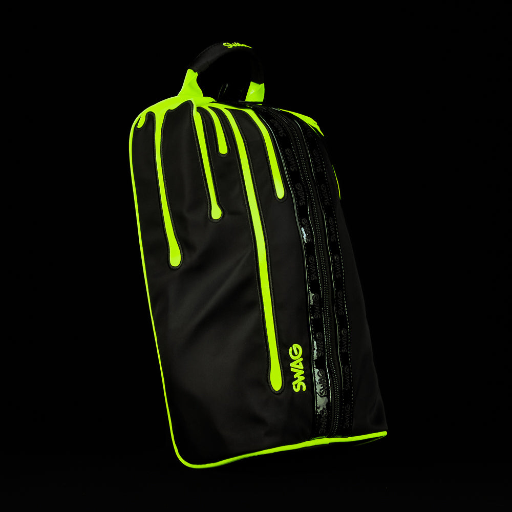 SWAG Neon Drip shoe bag in black with bright neon green drip design, zip closure, and carry handle.