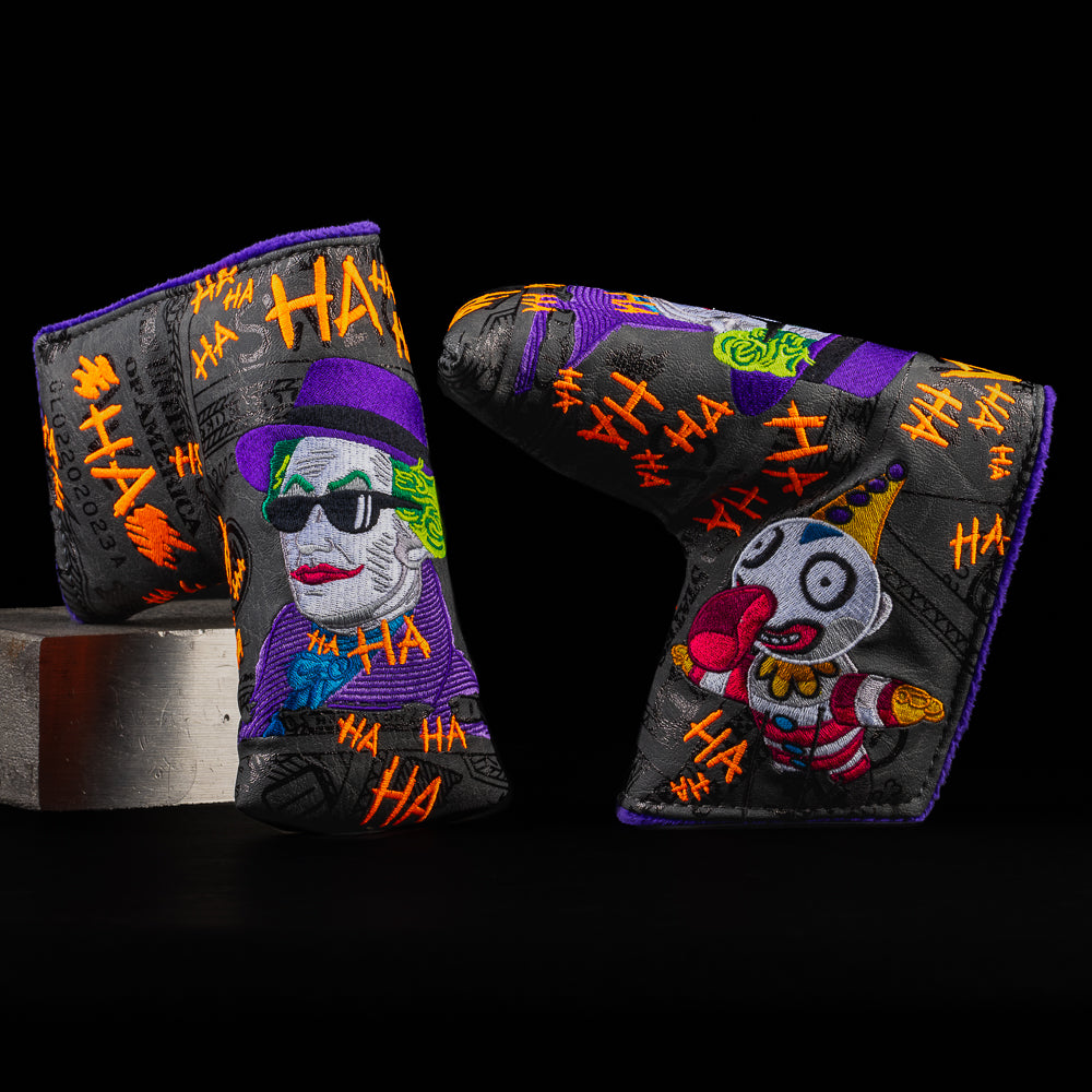 Defaced Jack Hamilton joker themed black, purple, orange and green blade putter golf head cover made in the USA.