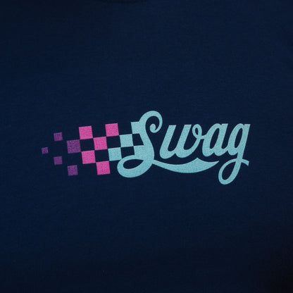 Close-up of the Lights Out Swagatha T-Shirt chest logo, displaying the pink checkered pattern fading into the teal SWAG script.
