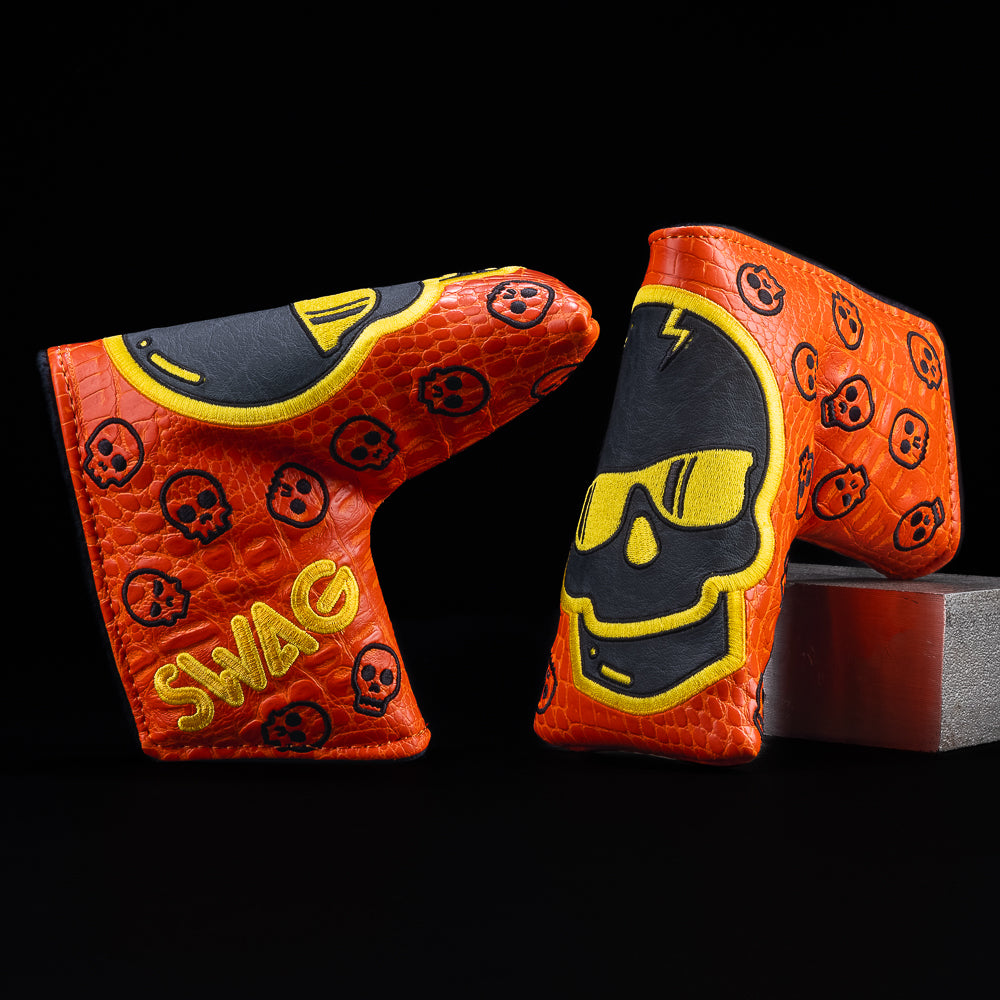 Faux exotic orange with black and orange skull blade golf headcover made in the USA.