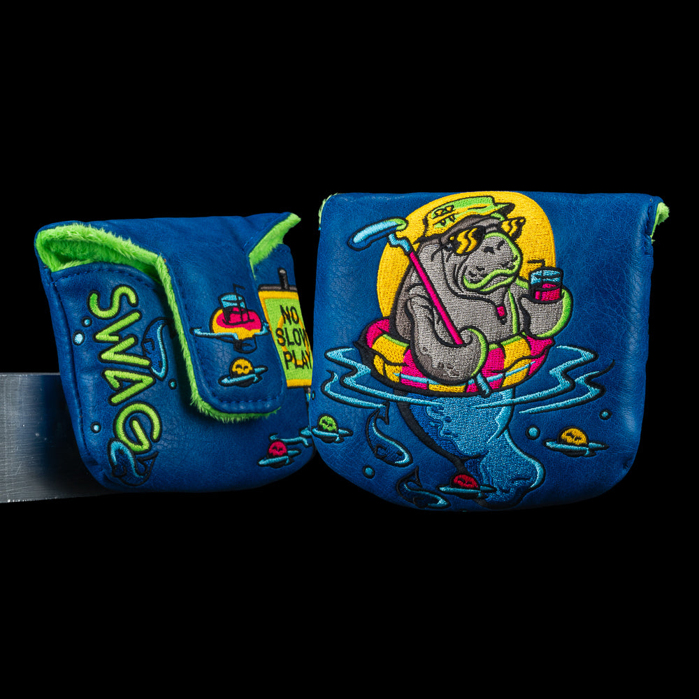 Mana-Tee Mallet headcover in ocean blue with neon manatee graphic, SWAG logo detail, and no slow play signage.