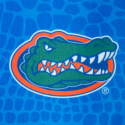 University of Florida Gators themed golf towel with cartoon gator and text on a blue background