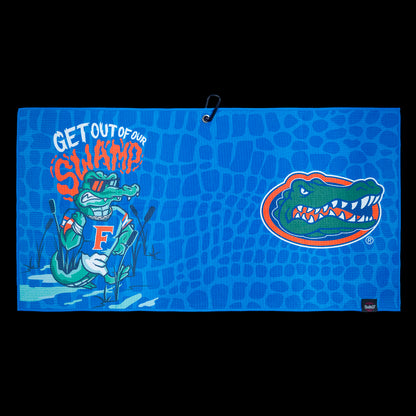 University of Florida Gators themed golf towel with cartoon gator and text on a blue background