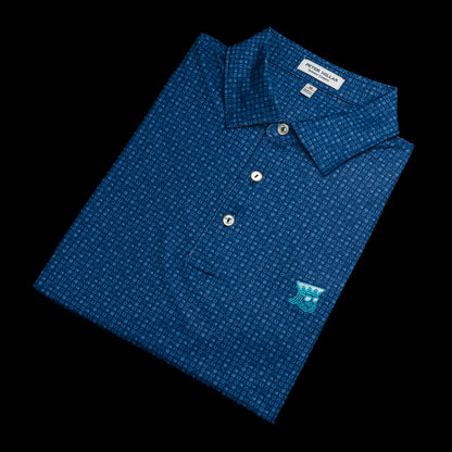 Navy blue Peter Millar Swag Polo with lucky charm pattern and blue swag king.